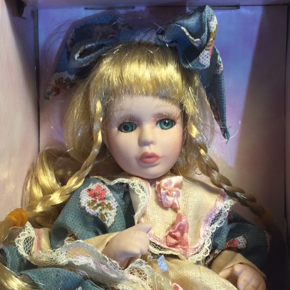 Girl with a golden Braids and Blue Hat “ by Christina”